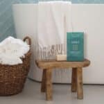 Reset Natural Bath Salts 70g On Stool Near Bath