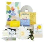 A Little Box Of Sunshine Gift Hamper with affirmation cards, notebook, shower steamer, chocolatge and hug keepsake