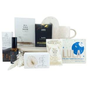 Rest Well and Recuperate Gift Hamper with organic tea, mug, relaxation book, self-warming eye mask, body mist, soap and chocolate treat