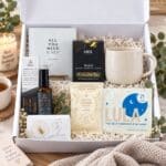 Rest Well and Recuperate Gift Hamper in open white gift box with relaxation, organic tea and self-care gifts for women and men