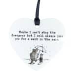 Can't Stop the Downpour white acrylic hanging ornament featuring Pooh and Piglet under an umbrella with inspirational encouragement quote and black satin ribbon.