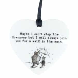 Can't Stop the Downpour white acrylic hanging ornament featuring Pooh and Piglet under an umbrella with inspirational encouragement quote and black satin ribbon.