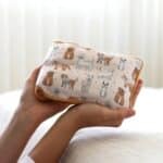 Cute Dog Heat Pillow in a ladies hand