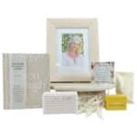 Her Smile Sympathy and Memorial Gift Hamper in a white gift box with an Even Though book, memorial photo frame, verse block, chocolate and shower steamer.