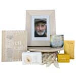 His Smile Sympathy & Memorial Gift Hamper in a white gift box with memorial keepsakes, comfort gifts and self-care products.
