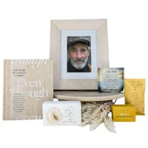 His Smile Sympathy & Memorial Gift Hamper in a white gift box with memorial keepsakes, comfort gifts and self-care products.