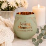 A beautiful sage green memorial votive candle holder with copper detailing, created as a thoughtful keepsake to honour the memory of someone special.