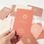 Motherhood Affirmation Cards in a hand
