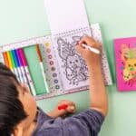 Portable Fruity Cutie Scented Colouring Set with eight fruity markers and 36 cute illustrated pages for children aged 4–7.