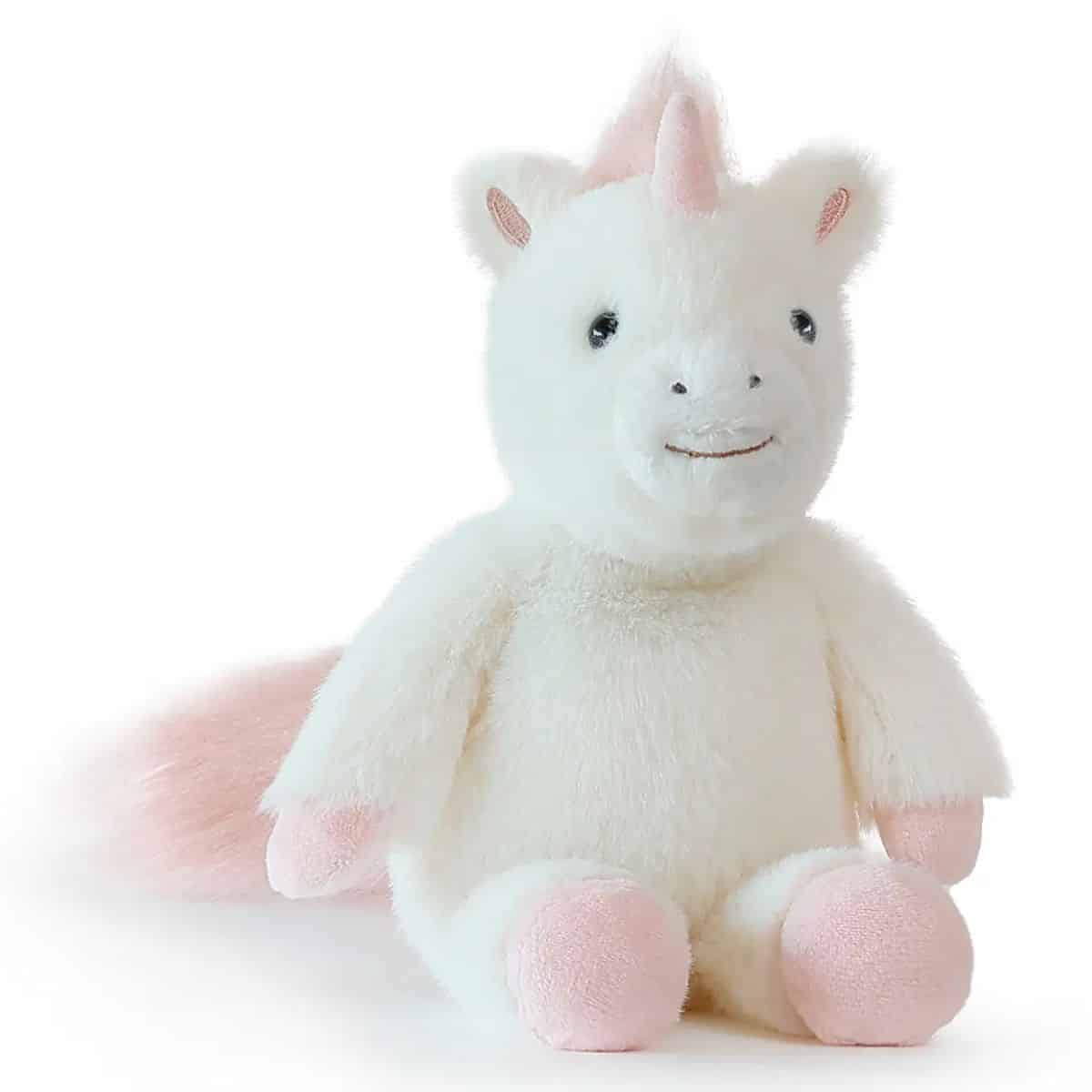 Plush white bunny with pink ears and paws, sitting and facing camera.