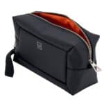 Men’s black toiletry bag with zip closure, internal mesh pocket and clip-on handle for travel and grooming essentials