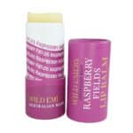 Pink lip balm tube with yellowish balm, labeled 'Wild Emery Australian Made' in gold lettering beside a rich pink cap.