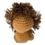Showing the back of the Positive Lion Support Crochet Plush
