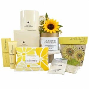 Sending Sunshine Sunflower Care Package with ceramic sunflower mug, organic herbal tea, Golden Glow self-care set, hand cream and sunflower seeds