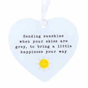 Sending Sunshine clear acrylic heart ornament with uplifting quote, sun motif and white satin hanging ribbon