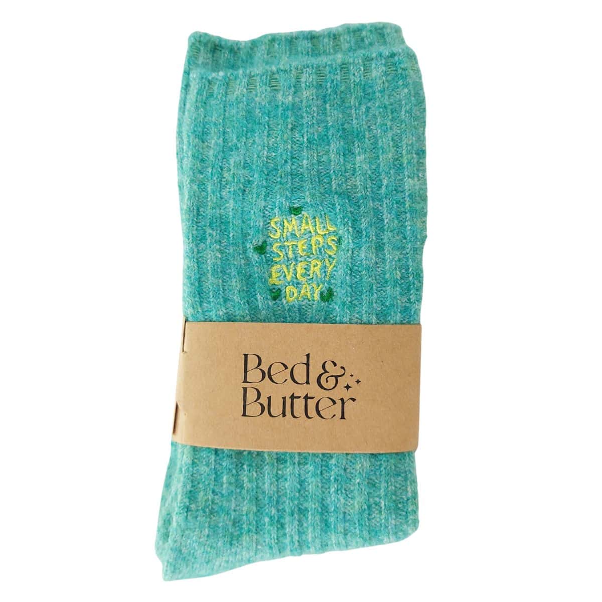 Cloud-soft mint ribbed socks embroidered with the uplifting words “small steps every day” and tiny green hearts