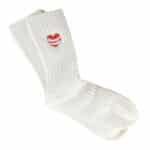 Cream ribbed Warm Hugs Comfiest Socks with an embroidered red heart wrapped in hugging arms