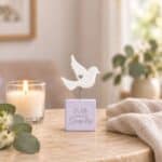 Purple sympathy sentiment block with white dove displayed as a peaceful memorial keepsake