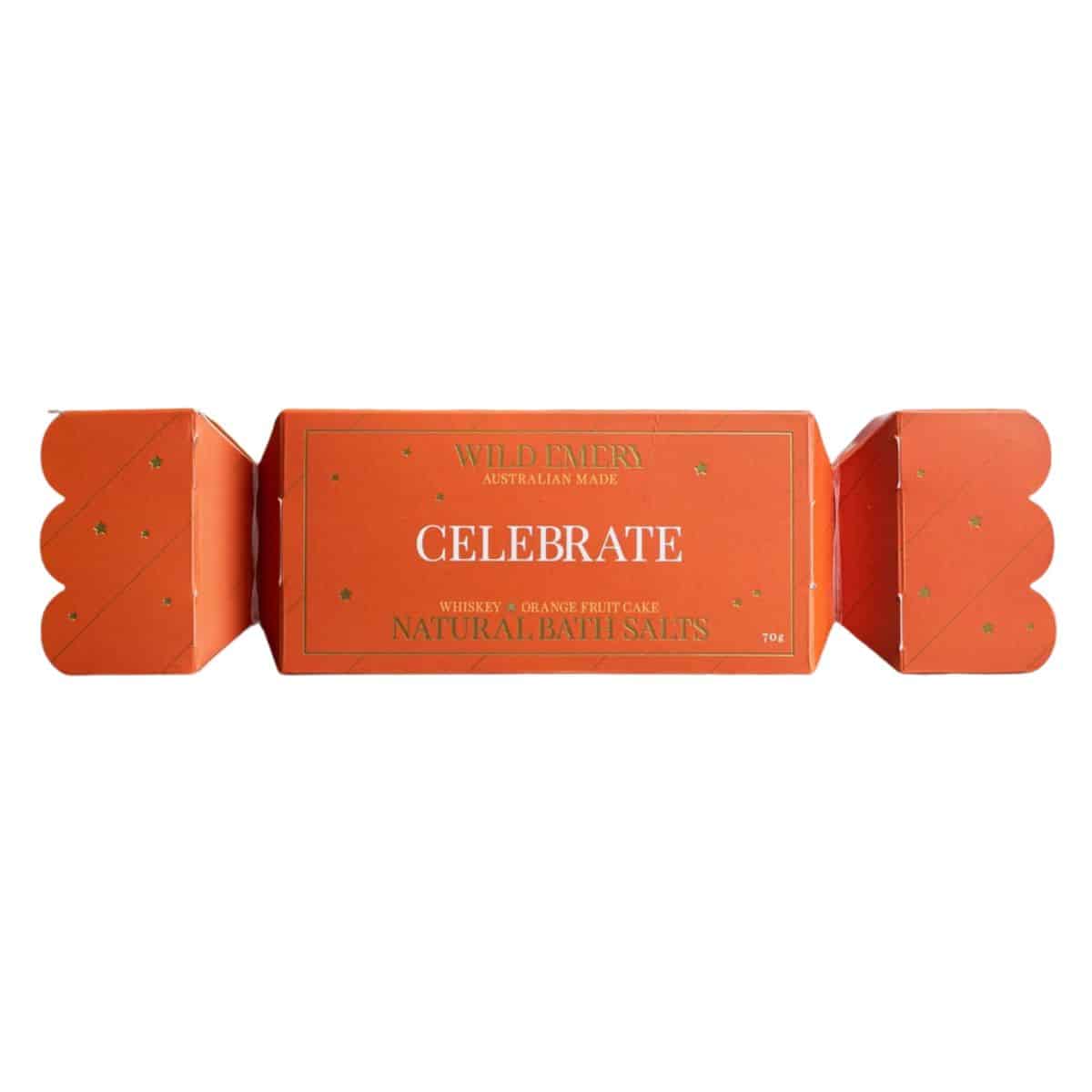 Wild Emery Celebrate Bath Salt Bon Bon 70g, Australian-made Christmas bath salts in orange festive packaging with gold stars.