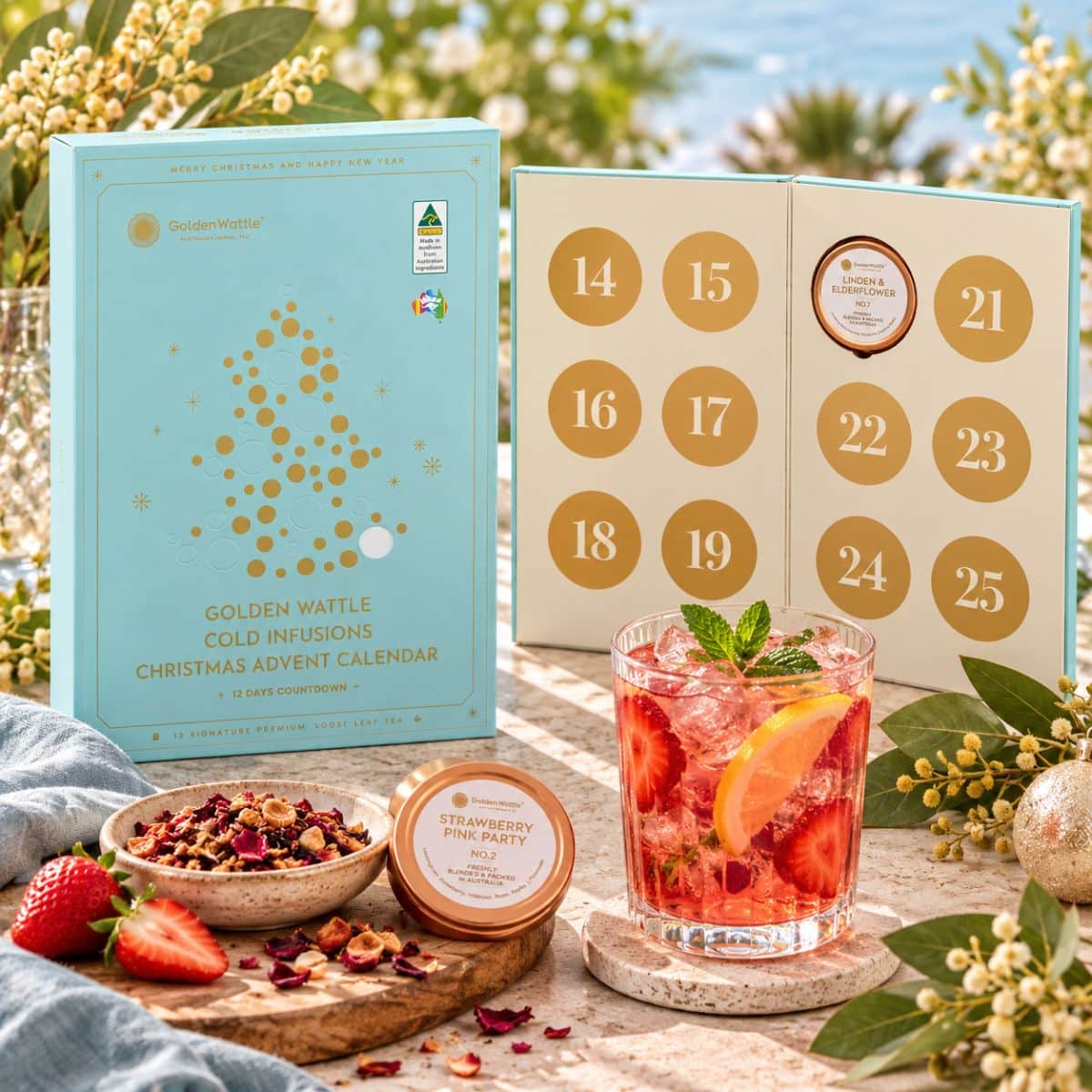 Australian Cold Infusions Tea Christmas Advent Calendar displayed with loose leaf tea tins and a refreshing glass of iced tea in a festive setting
