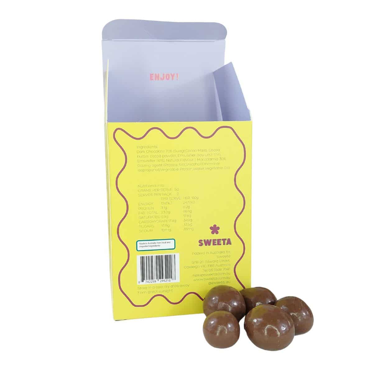 Back of packaging for the Milk Chocolate Macadamias 100g with a couple of chocolates at the base