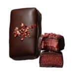 Close-up of Strawberry Vanilla Burst dark chocolate with chewy strawberry, hibiscus and vanilla filling